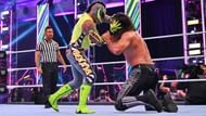 Rey attempts to take Seth's eye earlier in the match.